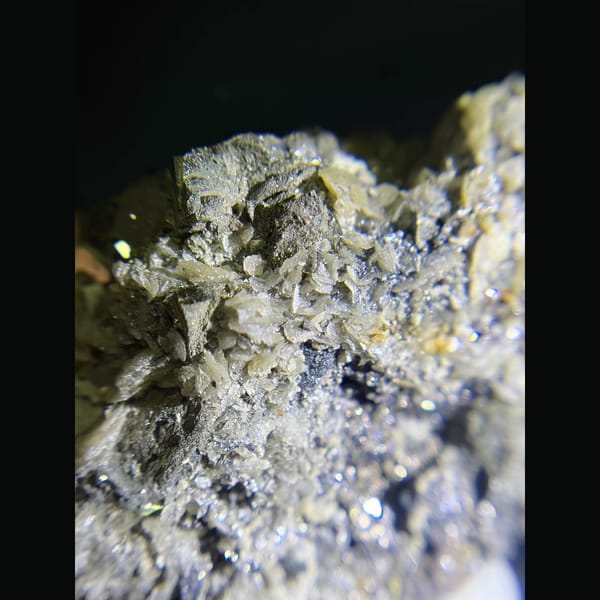Pyrite on zoned tabular barite from Morocco — detail view