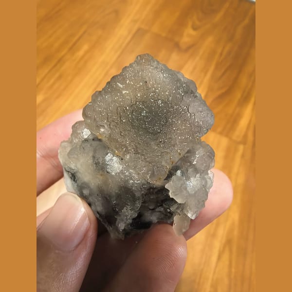 Fluorite on candle quartz — complete view