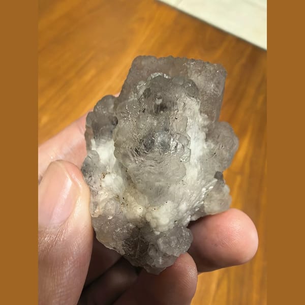 Fluorite on candle quartz — alternate view