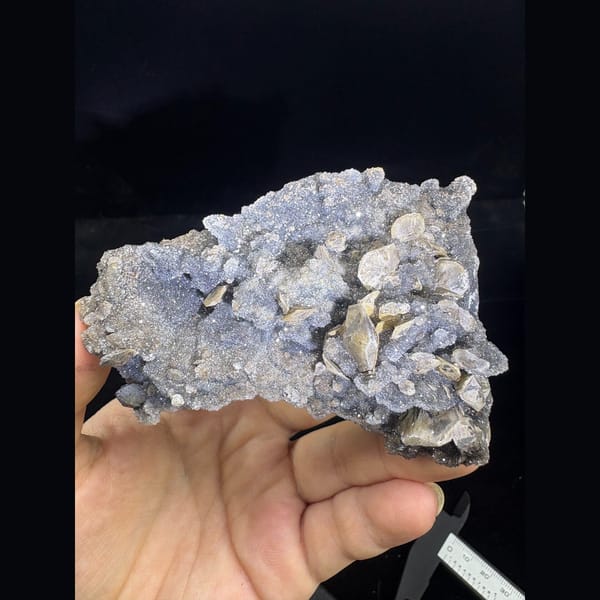 Grey sugary calcite plate with bladed crystals from Longyan — complete view