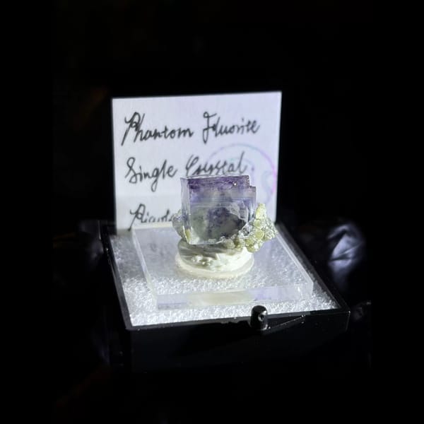 Purple phantom fluorite crystal from Piaotang — complete view