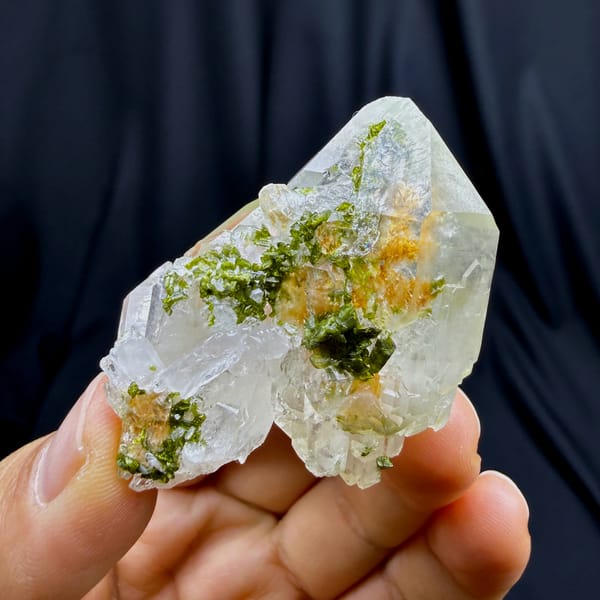 Clear quartz with green epidote inclusions from Sichuan — detail view