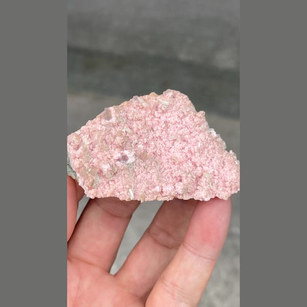Flat plate of frosty pink rhodochrosite from Bulgaria — alternate view