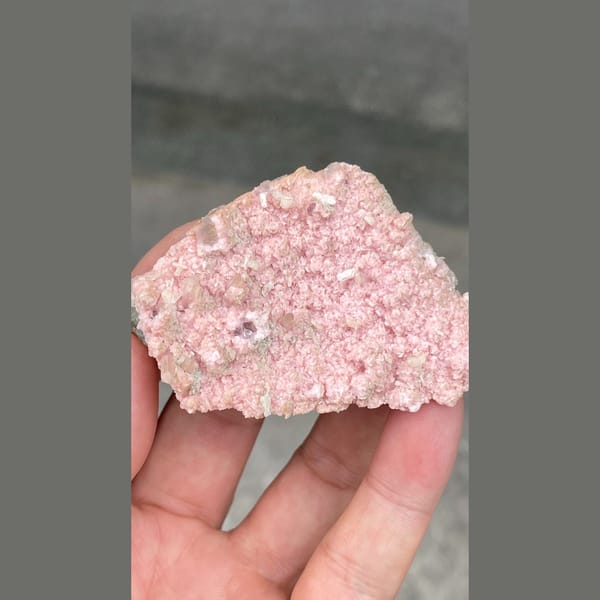 Flat plate of frosty pink rhodochrosite from Bulgaria — alternate view
