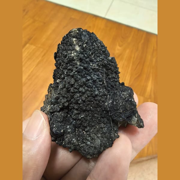 Black quartz cluster — complete view