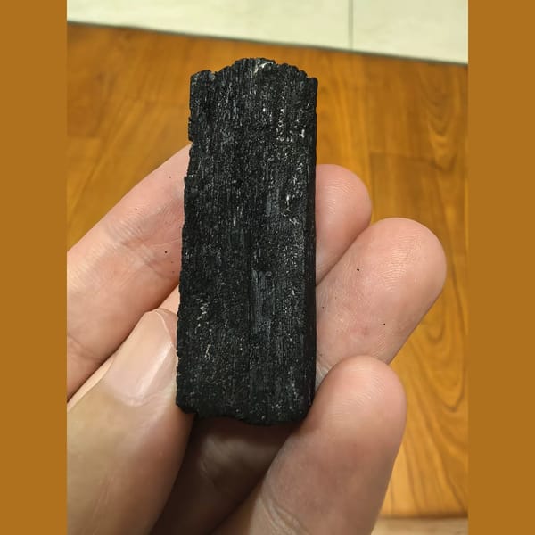 Lightly etched ilvaite crystal — alternate view