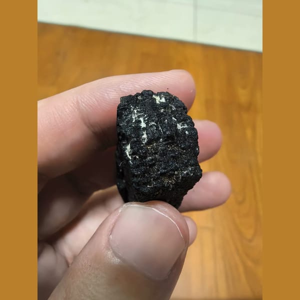 Lightly etched ilvaite crystal — alternate view