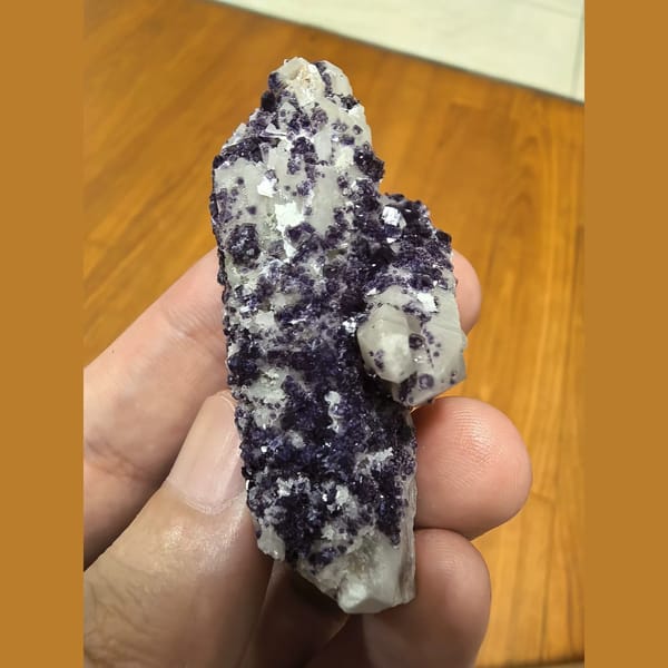 Quartz covered with bright purple fluorite — complete view