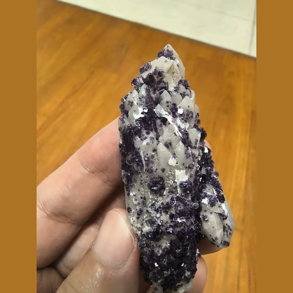 Quartz covered with bright purple fluorite — alternate view
