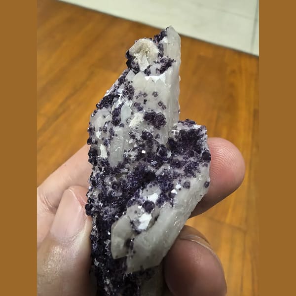 Quartz covered with bright purple fluorite — alternate view