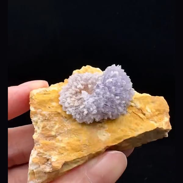 Lavender-purple creedite half-ball on golden-brown matrix from Guizhou — alternate view