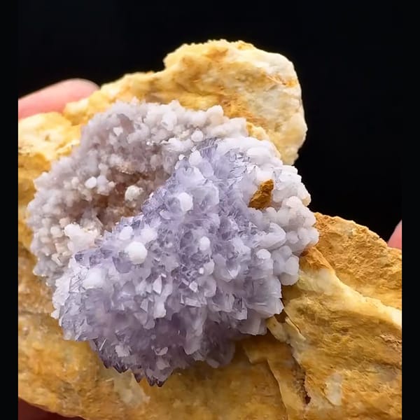 Lavender-purple creedite half-ball on golden-brown matrix from Guizhou — alternate view