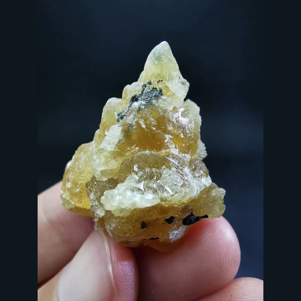 Amber calcite cluster — complete view