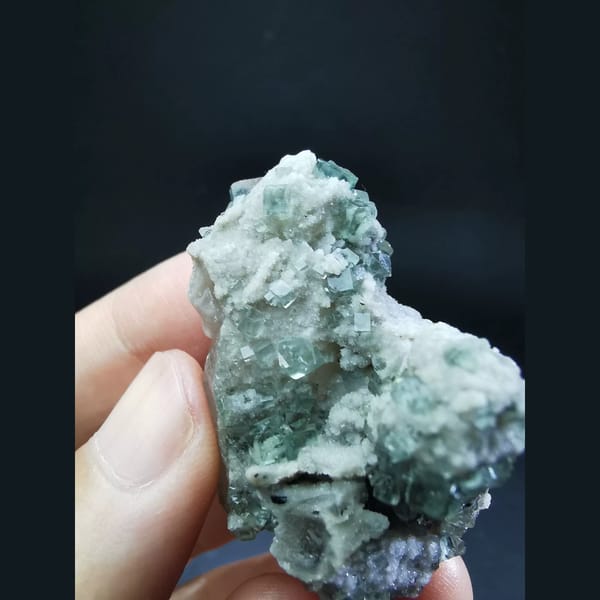 Clear blue fluorite on grey quartz — alternate view