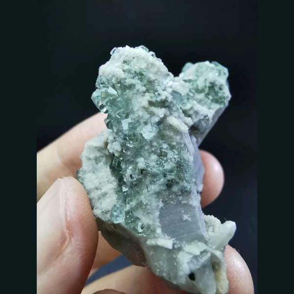 Clear blue fluorite on grey quartz — alternate view
