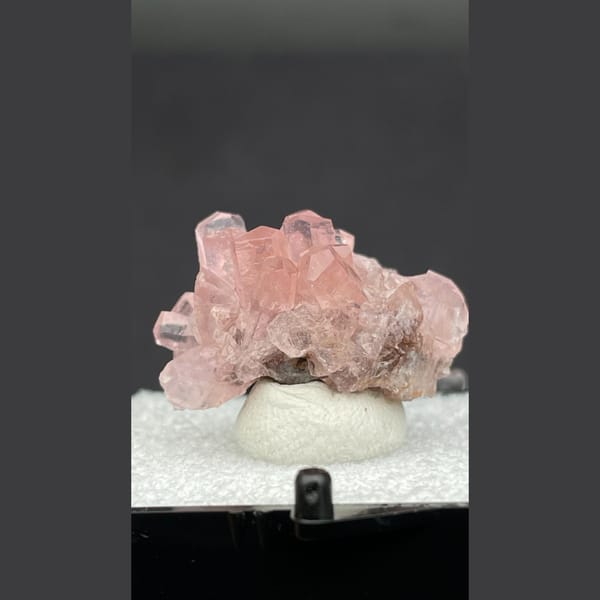 Bright pink cobaltoan calcite cluster from Morocco — complete view