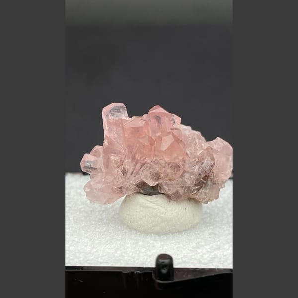 Bright pink cobaltoan calcite cluster from Morocco — alternate view