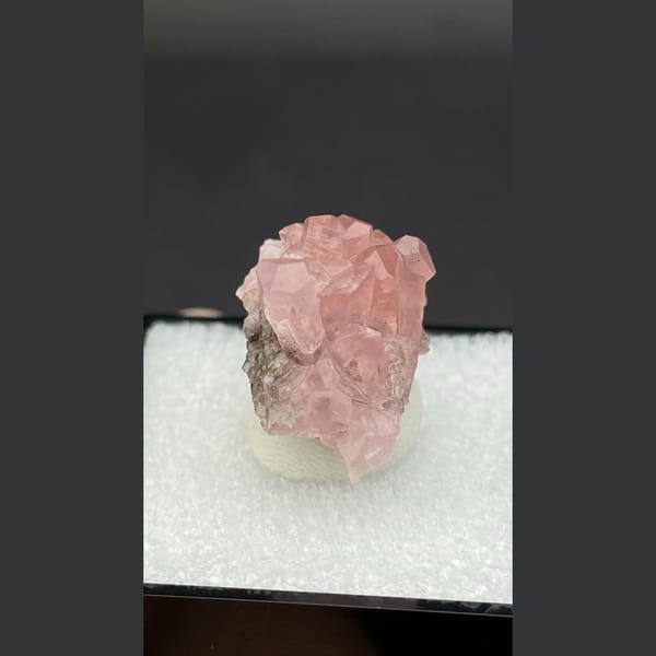 Bright pink cobaltoan calcite cluster from Morocco — detail view
