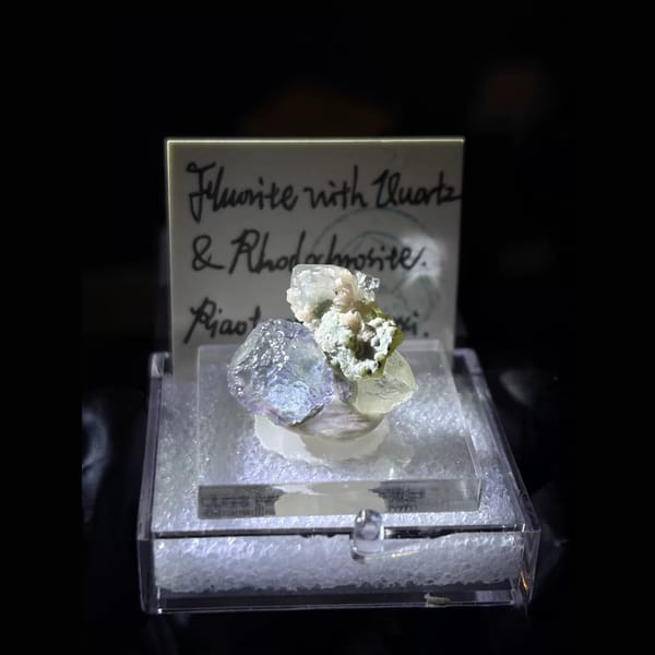 Etched blue fluorite with quartz and rhodochrosite from Piaotang — complete view