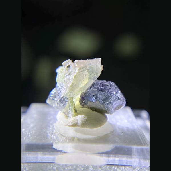 Etched blue fluorite with quartz and rhodochrosite from Piaotang — detail view