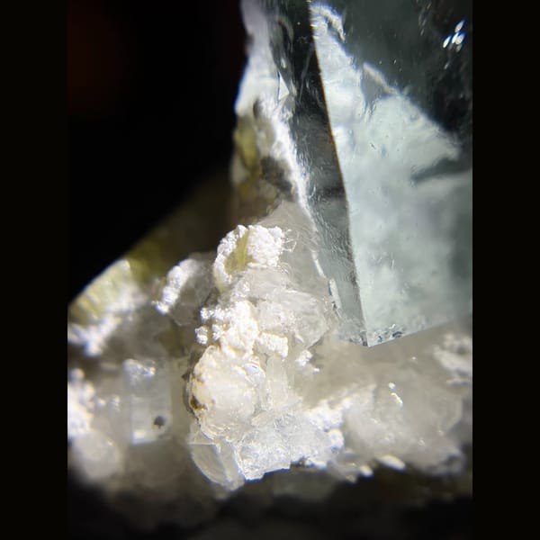 Mint-green cubic fluorite on quartz from Daguishan — detail view
