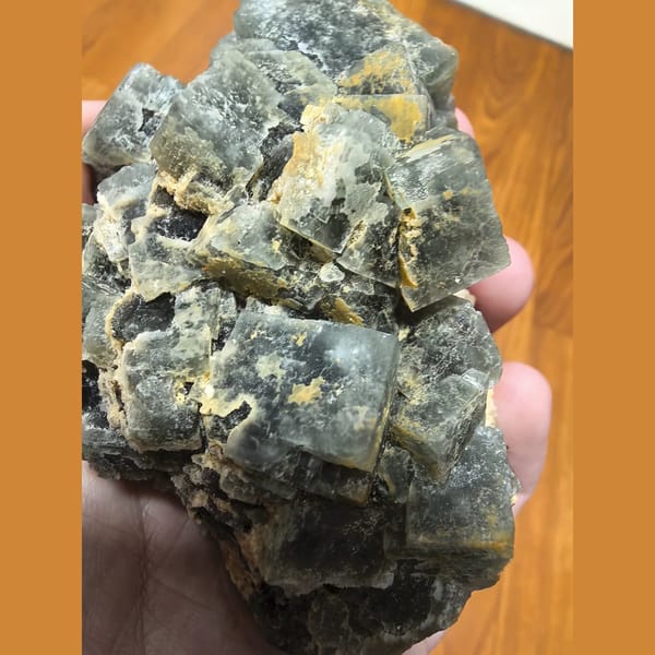 Large green cubic fluorite on candle quartz — alternate view