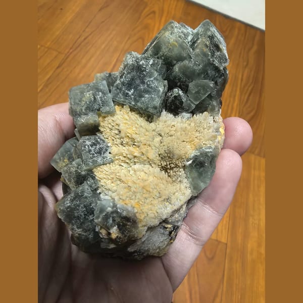Large green cubic fluorite on candle quartz — alternate view