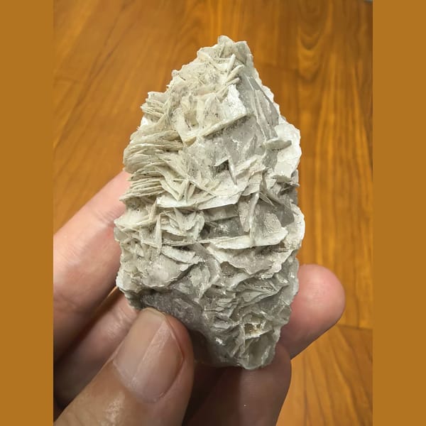 Quartz covered in white bladed calcite — alternate view