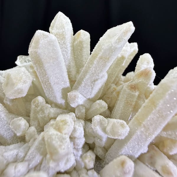 Dense cluster of frosted white quartz crystals from Guangdong — complete view