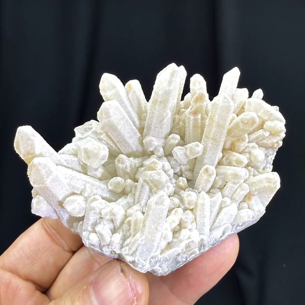 Dense cluster of frosted white quartz crystals from Guangdong — alternate view