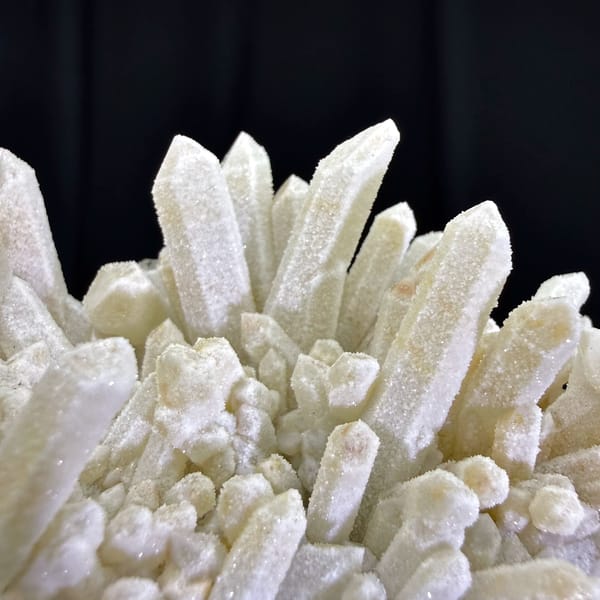 Dense cluster of frosted white quartz crystals from Guangdong — alternate view