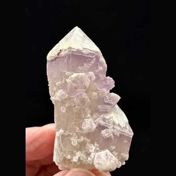 Pale lilac secondary-growth amethyst crystal from Inner Mongolia — complete view