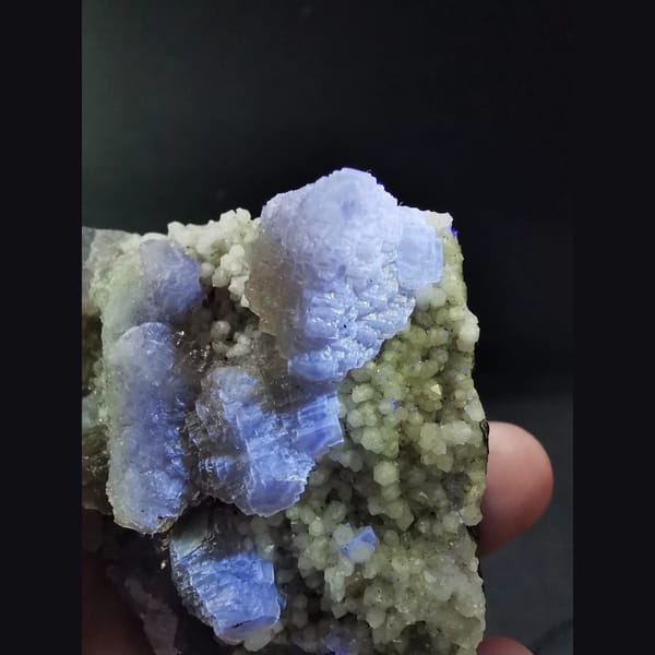 Pale green stepped fluorite on black sphalerite — detail view