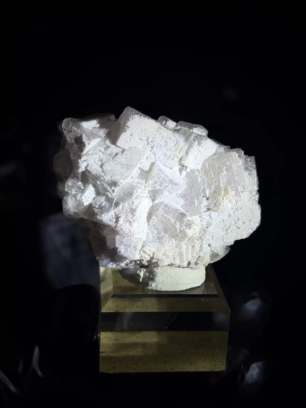 Complete front view of white porcelain-textured Yunnan fluorite