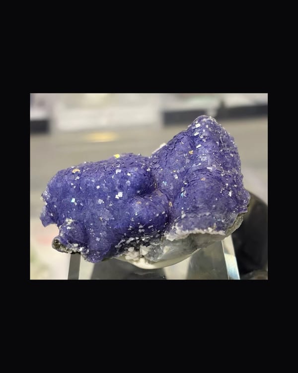 Complete front-left view of purple-blue microcrystalline fluorite
