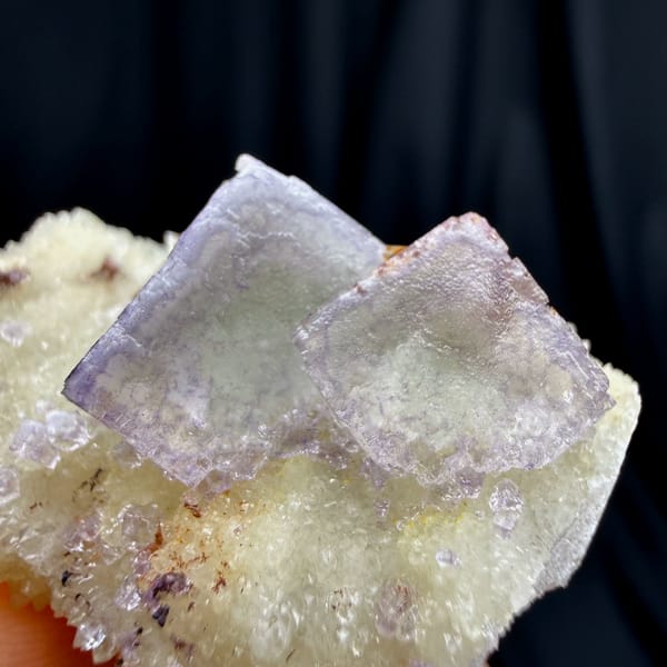 Pale lilac cubic fluorite on white creedite and quartz from Guizhou — alternate view