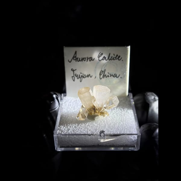 Aurora calcite flower cluster from Fujian — complete view