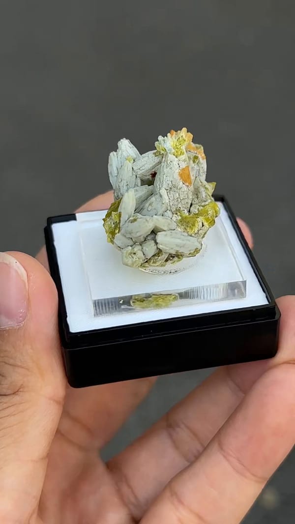 Pale green plumbogummite from Guilin Guangxi, complete broad reverse view from source video frame 315