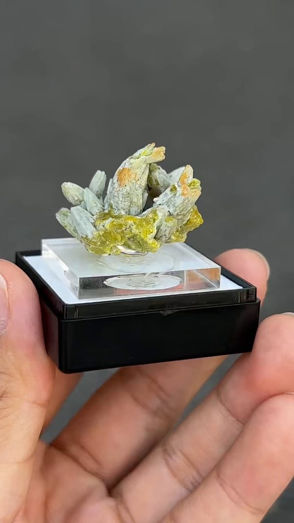 Pale green plumbogummite from Guilin Guangxi, complete narrow side and underside view from source video frame 390