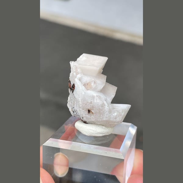 Stacked white bladed calcite with hemimorphite from Mexico — detail view