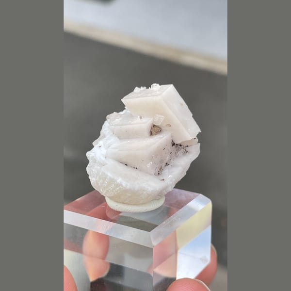 Stacked white bladed calcite with hemimorphite from Mexico — detail view