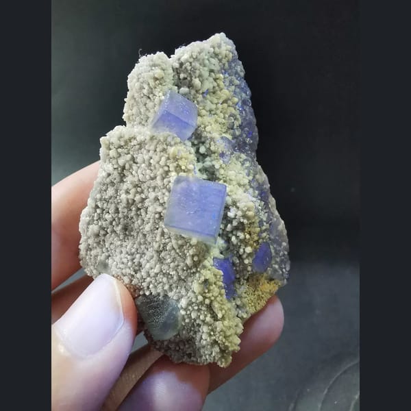 Muted green fluorite cubes on druzy matrix from Inner Mongolia — detail view