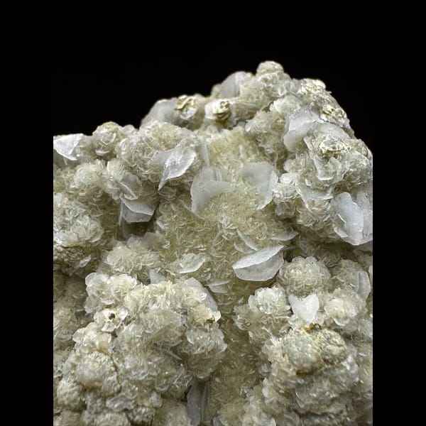 Quartz group covered in white petal calcite and yellow-green calcite from Inner Mongolia — alternate view