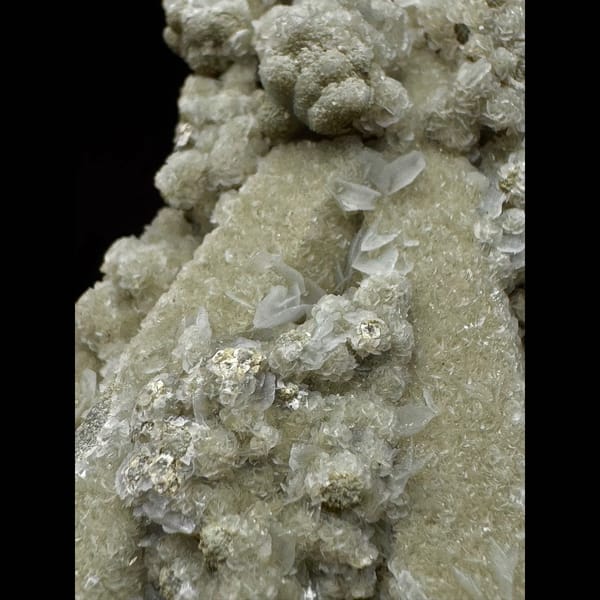Quartz group covered in white petal calcite and yellow-green calcite from Inner Mongolia — detail view