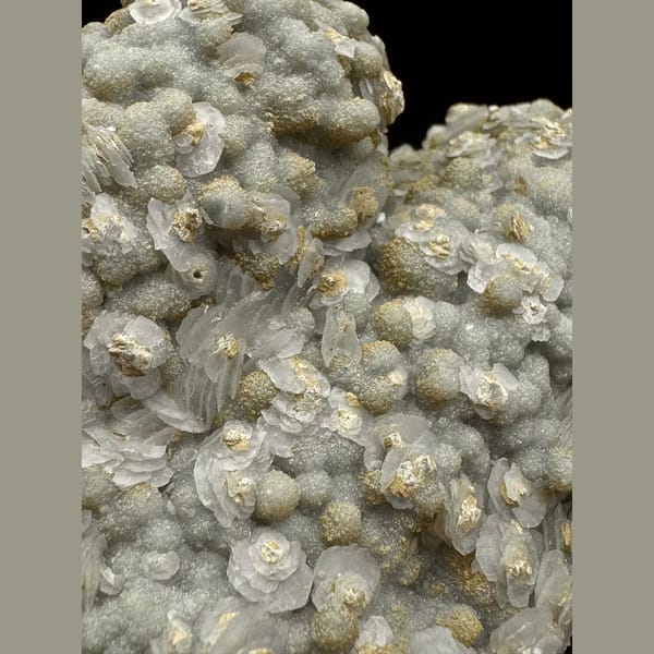 Quartz group covered in white petal calcite and yellow-green calcite from Inner Mongolia — detail view