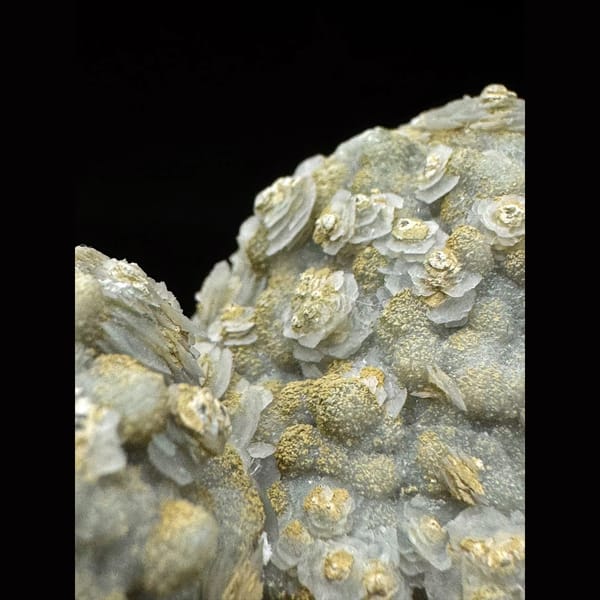 Quartz group covered in white petal calcite and yellow-green calcite from Inner Mongolia — detail view