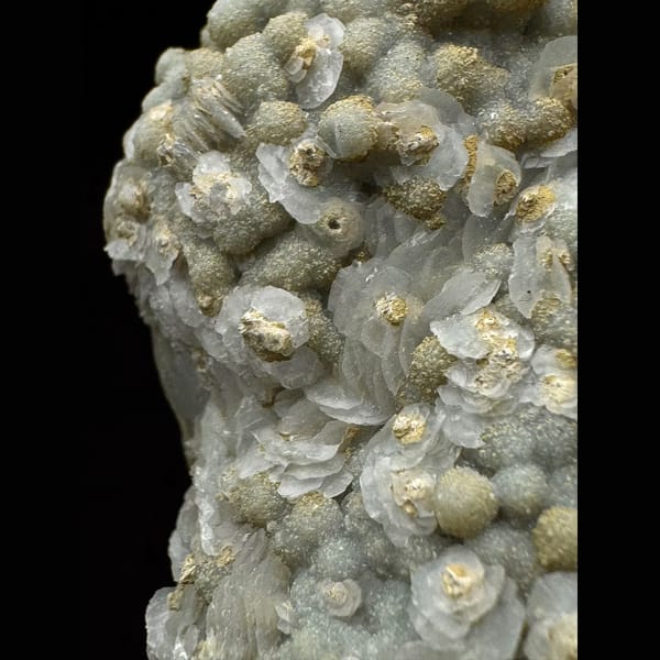Quartz group covered in white petal calcite and yellow-green calcite from Inner Mongolia — detail view
