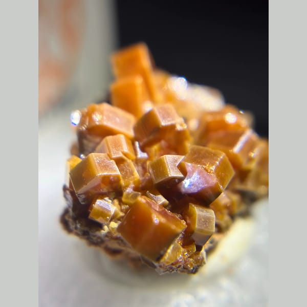 Chocolate-brown vanadinite cluster from Morocco — detail view