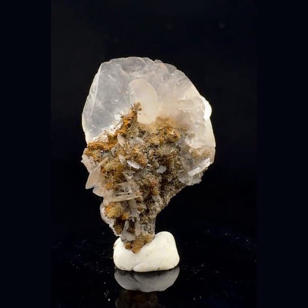 Translucent fan-shaped calcite blades on brown crystals from Fujian — complete view