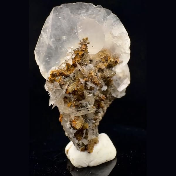 Translucent fan-shaped calcite blades on brown crystals from Fujian — detail view